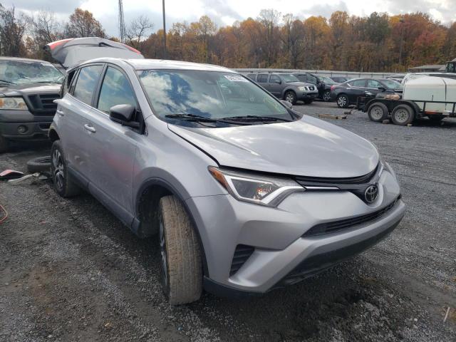 TOYOTA RAV4 LE 2018 with VIN 2T3BFREV5JW709035 - Photo from auction