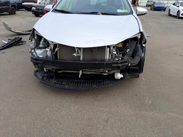 Photo 9 from auction – 2014 TOYOTA COROLLA L with VIN 2T1BURHE0EC074176