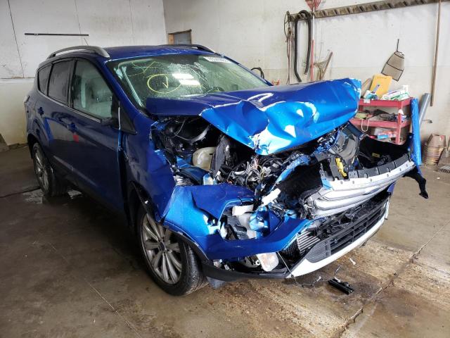 FORD ESCAPE TIT 2017 with VIN 1FMCU0J94HUC68483 - Photo from auction