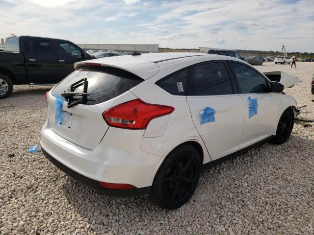 Photo 4 from auction – 2015 FORD FOCUS TITA with VIN 1FADP3N26FL323443
