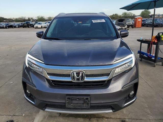 Photo 5 from auction – 2021 HONDA PILOT TOUR with VIN 5FNYF5H68MB014713