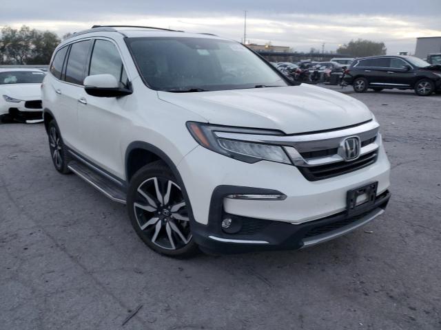 HONDA PILOT TOUR 2019 with VIN 5FNYF5H99KB020169 - Photo from auction