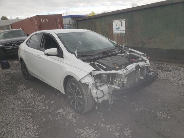 TOYOTA COROLLA L 2017 with VIN 5YFBURHE5HP678570 - Photo from auction