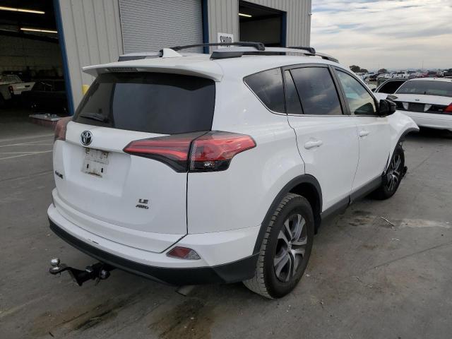Photo 4 from auction – 2018 TOYOTA RAV4 LE with VIN 2T3BFREVXJW846701