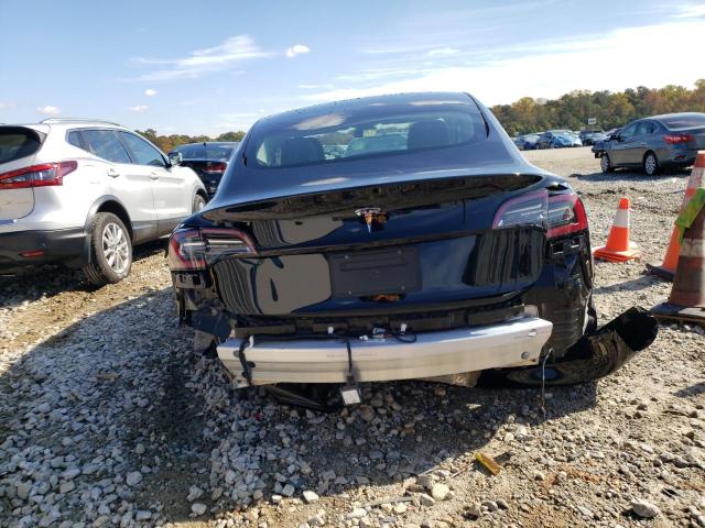 Photo 9 from auction – 2022 TESLA MODEL 3 with VIN 5YJ3E1EA2NF190057