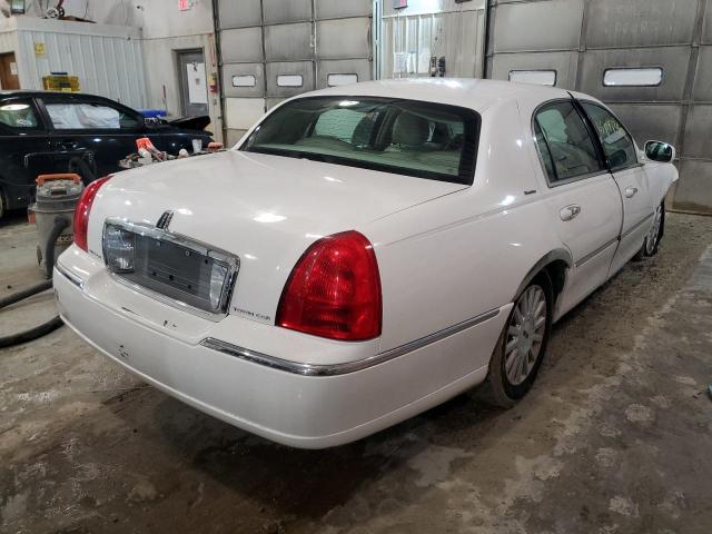Photo 4 from auction – 2003 LINCOLN TOWN CAR E with VIN 1LNHM81W83Y694690