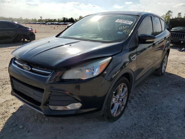 Photo 2 from auction – 2013 FORD ESCAPE SEL with VIN 1FMCU0HXXDUB86210