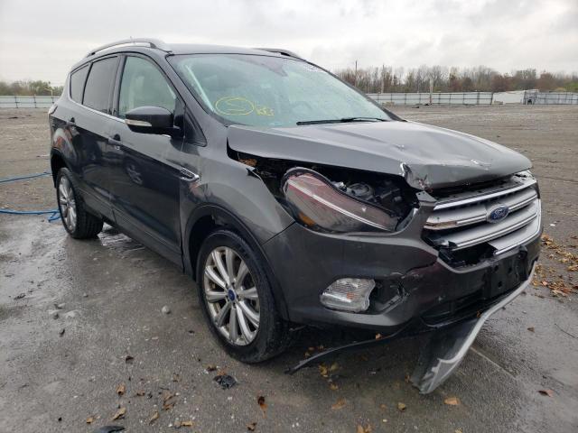 FORD ESCAPE TIT 2017 with VIN 1FMCU0J98HUC49581 - Photo from auction