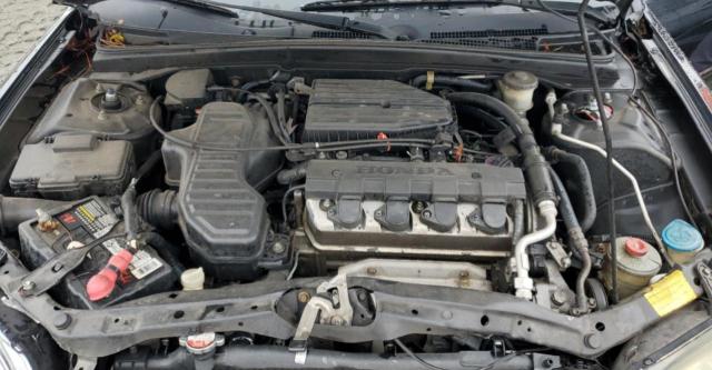 Photo 7 from auction – 2002 HONDA CIVIC LX with VIN 2HGES16502H564241