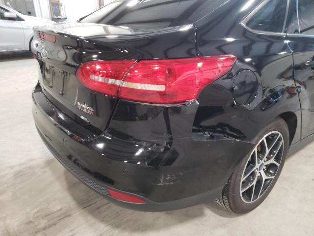 Photo 9 from auction – 2017 FORD FOCUS SEL with VIN 1FADP3H20HL327020