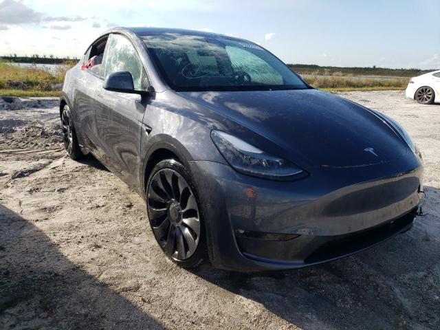 TESLA MODEL Y 2022 with VIN 7SAYGDEF2NF376827 - Photo from auction