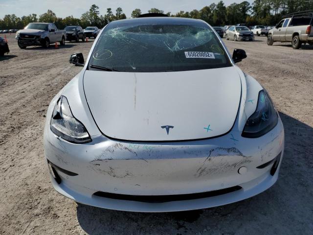 Photo 9 from auction – 2021 TESLA MODEL 3 with VIN 5YJ3E1EA4MF991541