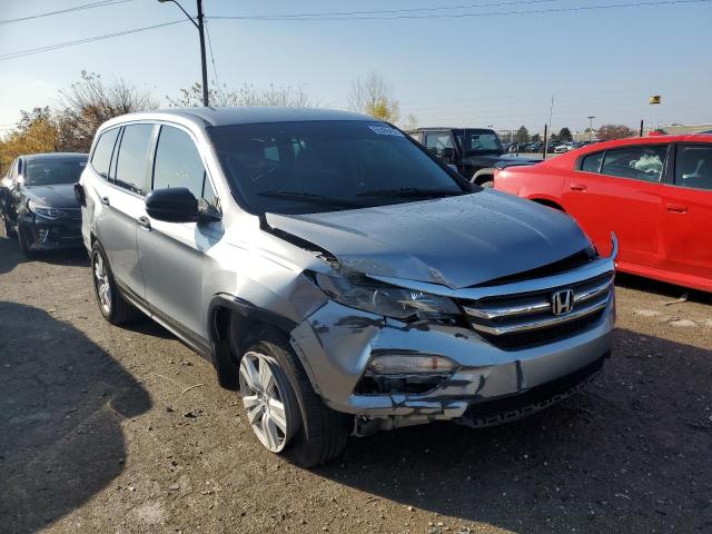 HONDA PILOT LX 2018 with VIN 5FNYF6H18JB064971 - Photo from auction
