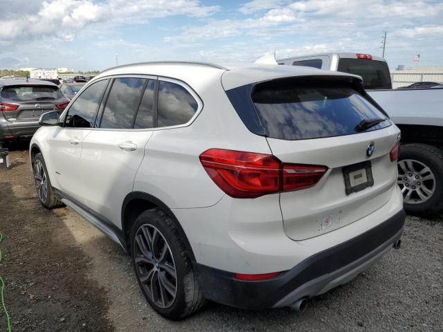 Photo 3 from auction – 2018 BMW X1 XDRIVE2 with VIN WBXHT3C35J5K24065