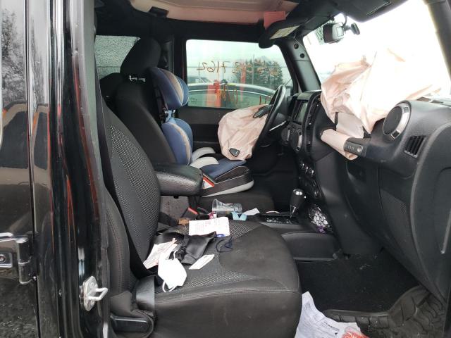 Photo 5 from auction – 2016 JEEP WRANGLER U with VIN 1C4BJWDG7GL145674