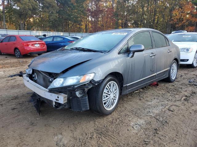 Photo 2 from auction – 2011 HONDA CIVIC LX with VIN 19XFA1F56BE012874