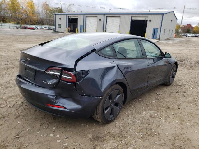 Photo 4 from auction – 2022 TESLA MODEL 3 with VIN 5YJ3E1EB4NF106734