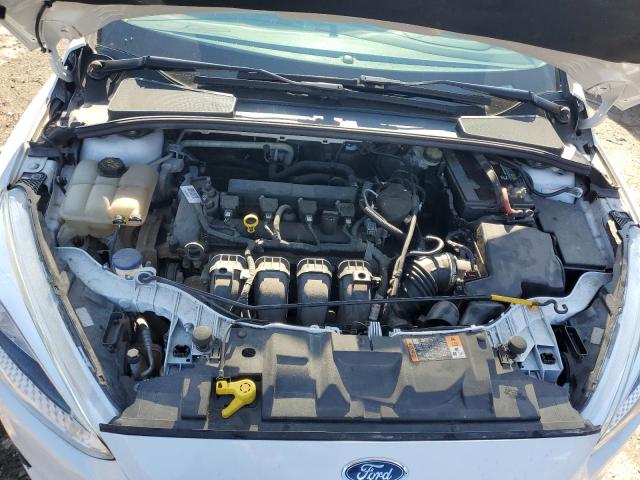 Photo 7 from auction – 2015 FORD FOCUS S with VIN 1FADP3E2XFL367512