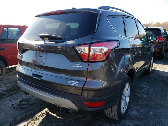 Photo 4 from auction – 2018 FORD ESCAPE SE with VIN 1FMCU0GD2JUC38044