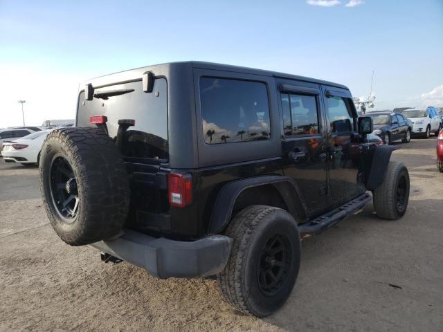 Photo 4 from auction – 2011 JEEP WRANGLER U with VIN 1J4BA3H12BL542944