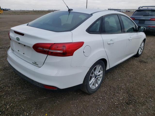 Photo 4 from auction – 2016 FORD FOCUS SE with VIN 1FADP3F21GL400462