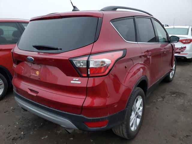 Photo 4 from auction – 2018 FORD ESCAPE SE with VIN 1FMCU0GD9JUC03310