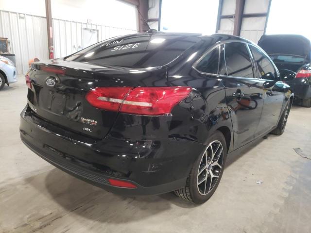 Photo 4 from auction – 2017 FORD FOCUS SEL with VIN 1FADP3H20HL327020