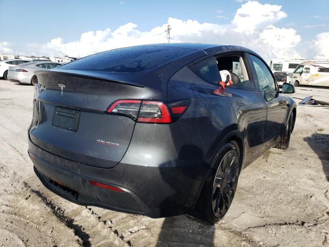 Photo 4 from auction – 2022 TESLA MODEL Y with VIN 7SAYGDEF2NF376827