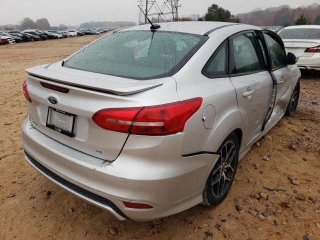 Photo 4 from auction – 2016 FORD FOCUS SE with VIN 1FADP3F21GL221337
