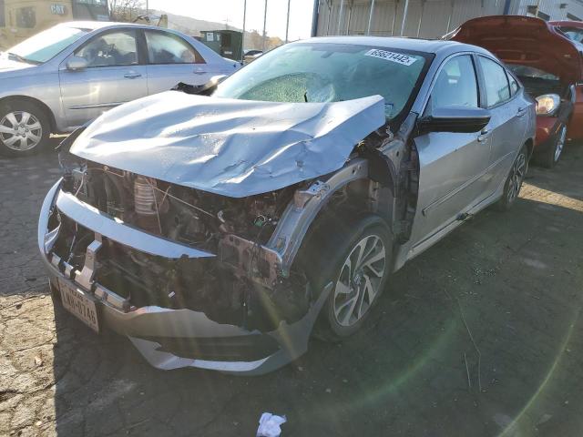 Photo 9 from auction – 2018 HONDA CIVIC EX with VIN 19XFC2F79JE007040