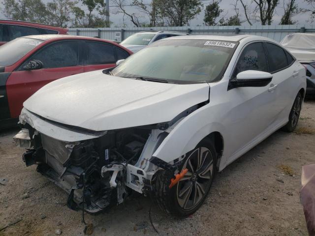 Photo 2 from auction – 2018 HONDA CIVIC EX with VIN JHMFC1F33JX033137