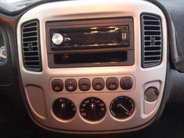 Photo 9 from auction – 2007 FORD ESCAPE LIM with VIN 1FMCU04107KA66840