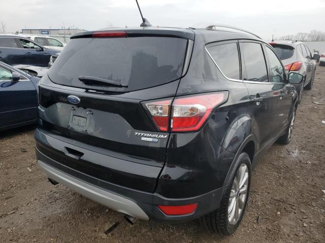 Photo 4 from auction – 2018 FORD ESCAPE TIT with VIN 1FMCU9J96JUB21463