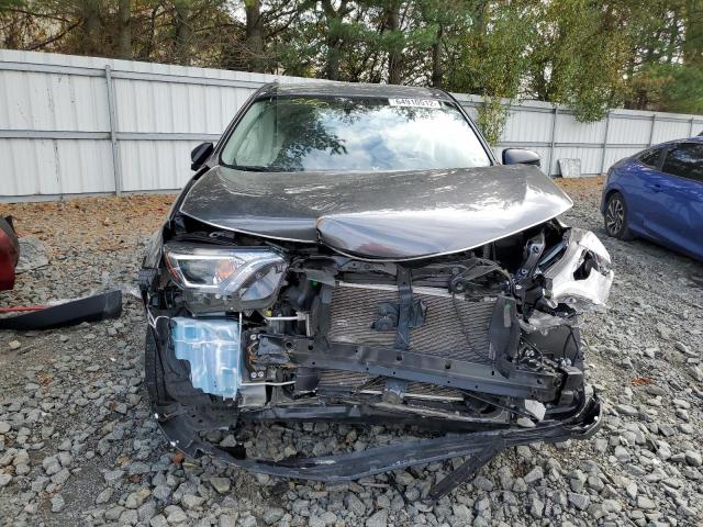 Photo 9 from auction – 2018 TOYOTA RAV4 LE with VIN JTMBFREV7JD250555