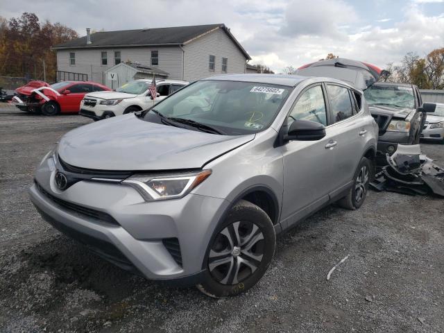 Photo 2 from auction – 2018 TOYOTA RAV4 LE with VIN 2T3BFREV5JW709035