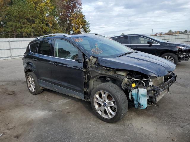 FORD ESCAPE TIT 2016 with VIN 1FMCU0JX6GUB87921 - Photo from auction
