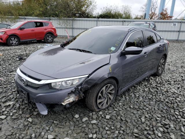 Photo 9 from auction – 2018 HONDA CIVIC EX with VIN 2HGFC2F79JH560020