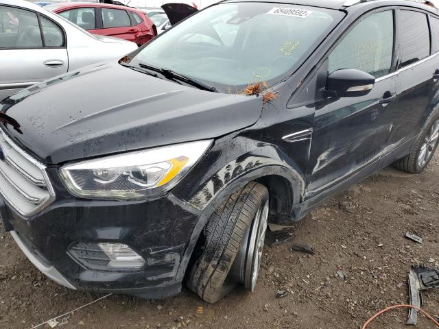 Photo 9 from auction – 2018 FORD ESCAPE TIT with VIN 1FMCU9J96JUB21463