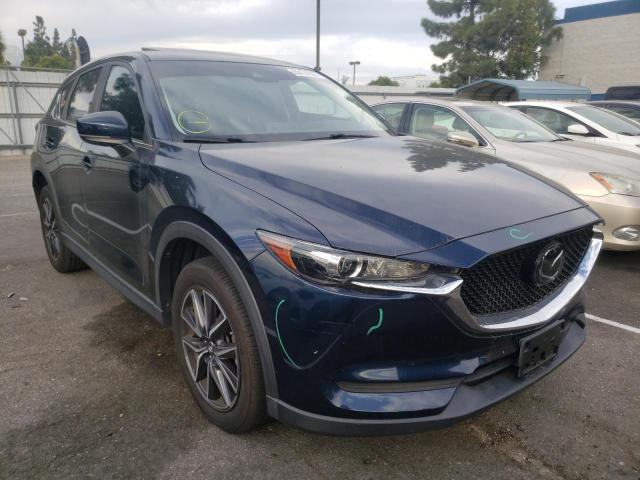 MAZDA CX-5 TOURI 2018 with VIN JM3KFACMXJ0471318 - Photo from auction
