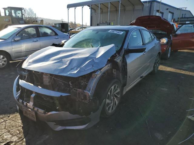 Photo 2 from auction – 2018 HONDA CIVIC EX with VIN 19XFC2F79JE007040