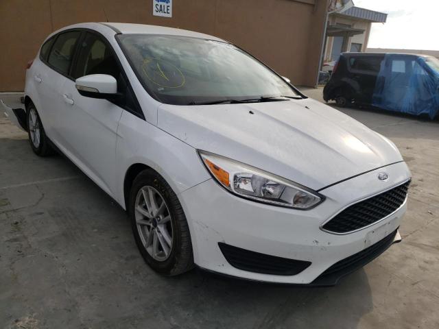 FORD FOCUS SE 2017 with VIN 1FADP3K2XHL223904 - Photo from auction