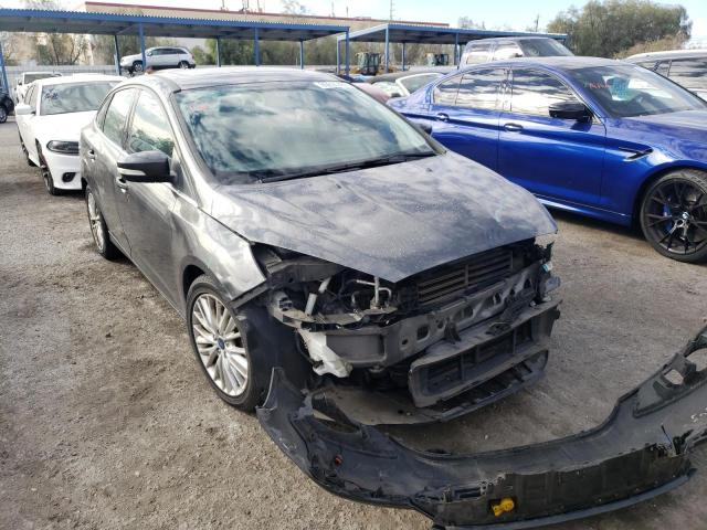 FORD FOCUS TITA 2016 with VIN 1FADP3J20GL374864 - Photo from auction
