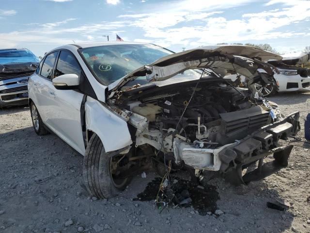 FORD FOCUS SE 2014 with VIN 1FADP3F23EL157864 - Photo from auction
