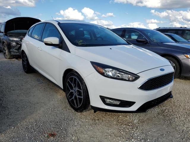 FORD FOCUS SEL 2018 with VIN 1FADP3M20JL249852 - Photo from auction