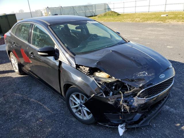 FORD FOCUS SE 2016 with VIN 1FADP3F20GL285708 - Photo from auction