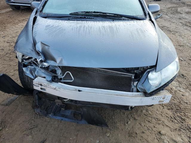 Photo 9 from auction – 2011 HONDA CIVIC LX with VIN 19XFA1F56BE012874