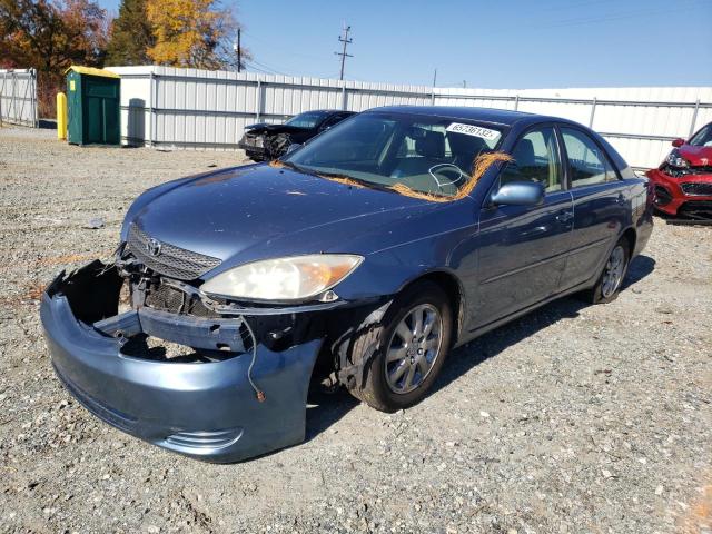 Photo 2 from auction – 2002 TOYOTA CAMRY LE with VIN JTDBF30K520014845