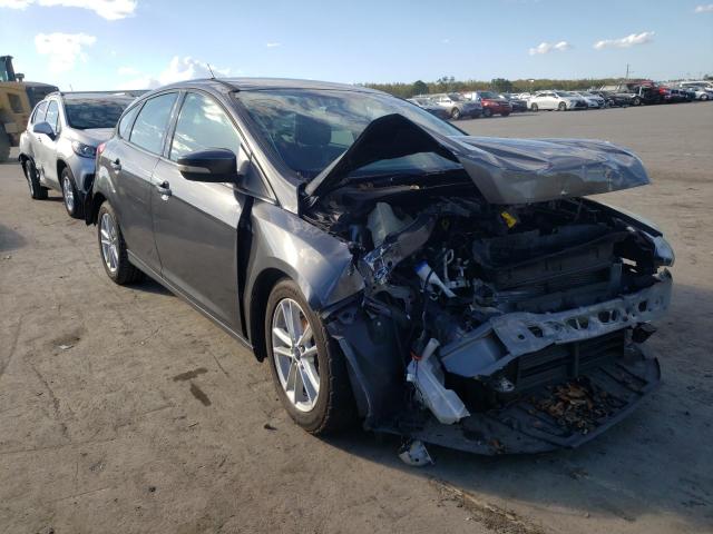 FORD FOCUS SE 2015 with VIN 1FADP3K22FL238572 - Photo from auction