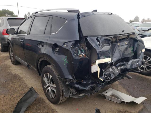 Photo 3 from auction – 2018 TOYOTA RAV4 LE with VIN JTMZFREV9JD115849