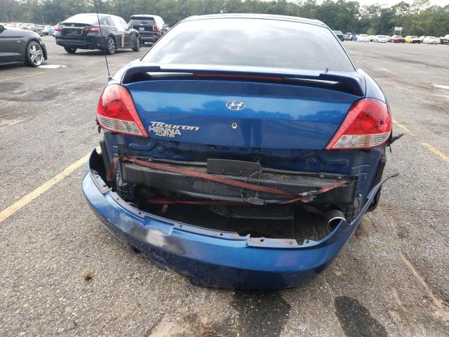Photo 9 from auction – 2005 HYUNDAI TIBURON with VIN KMHHM65D95U168348